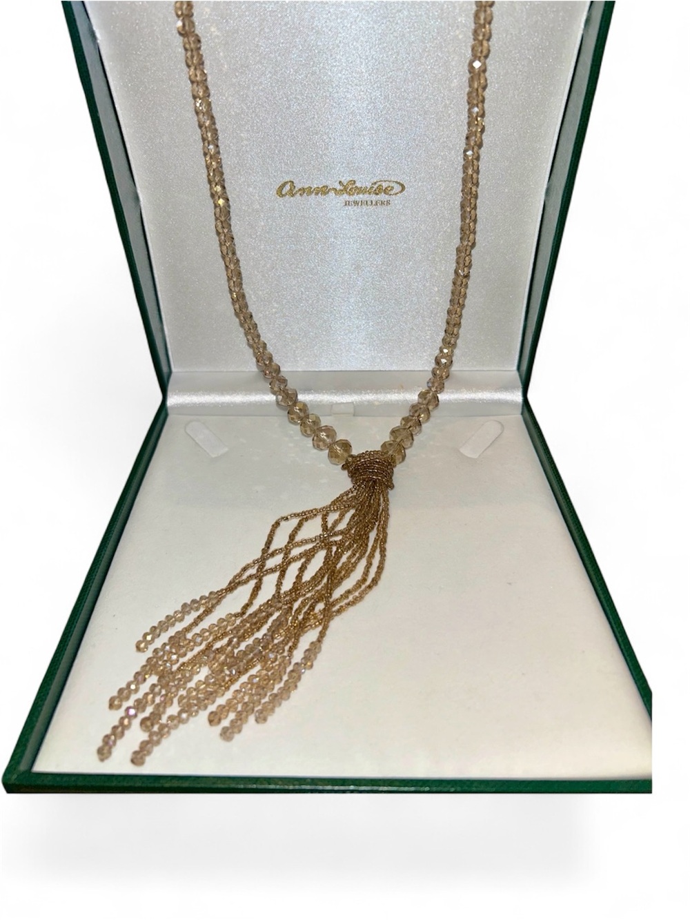 Beaded lariat necklace with multi-strand fringe tassel wrapped knot